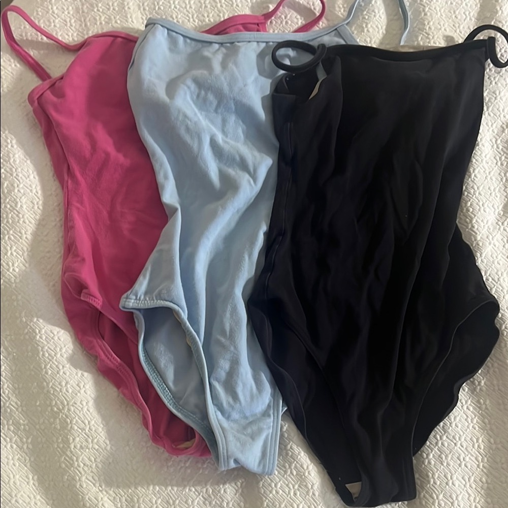 Motionwear Dance Leotards in Black, Pink, and Blue